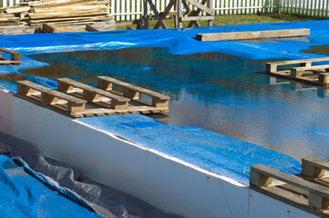 Unfinished basement covered with PVC foil