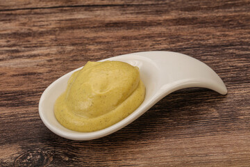 Dijon mustard sauce in the bowl
