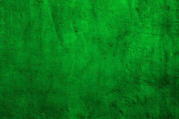 Green colored abstract wall background with textures of shades of green