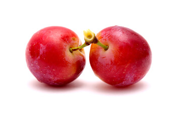Small cherry plums, isolated on white background