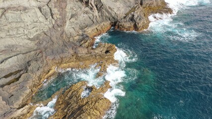 mighty ocean spitting out the cliffs