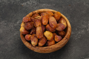 Sweet tasty dry dates in the basket