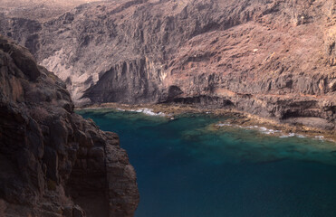 Gran Canaria, steep eroded coast line of Agaete municipality, path to Playa del Juncal beach 