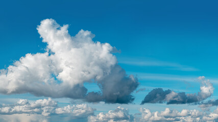 Abstract natural background, sky and puffy clouds,