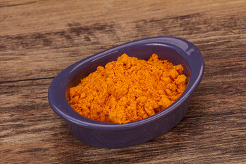 Tumeric powder in the bowl