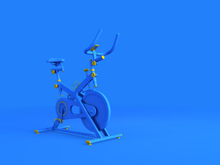 Stationary spinning bike isolated on blue background. Stationary excersise bike minimal blue background concept. Trainer bike blue color minimalist mock up idea.