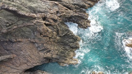 mighty ocean spitting out the cliffs