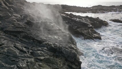 mighty ocean spitting out the cliffs