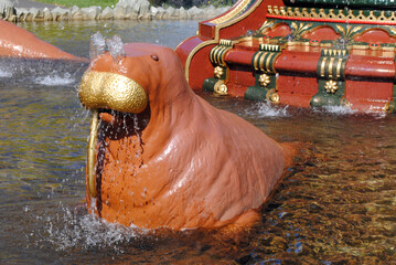 Decorative Iron Walrus with Only One Tusk in  Waters of Public Fountain