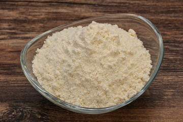 Wheat flour heap in the bowl