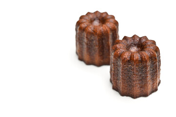 Canele, French pastry, on white background