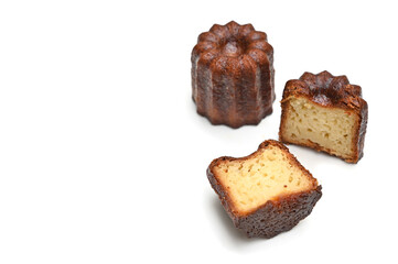 Canele, French pastry, on white background