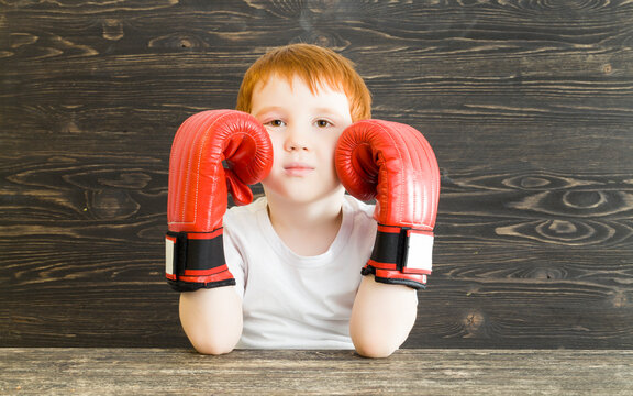 boy with boxing gloves
