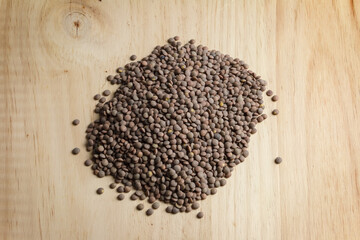 lentils on light wooden table