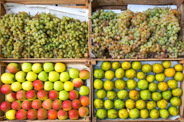 Roadside stand selling organic fruits exposed on newspaper, Ararat Province, Armenia