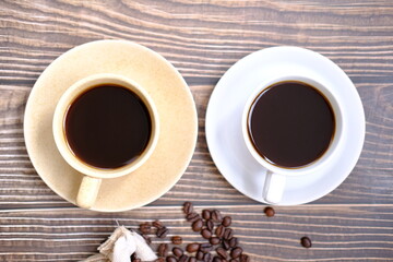 cup of coffee with cinnamon sticks