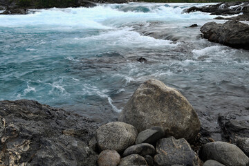 Rapids at the confluence of blue Baker river and grey Neff river, Pan-American Highway between Cochrane and Puerto Guadal, Aysen Region, Patagonia, Chile