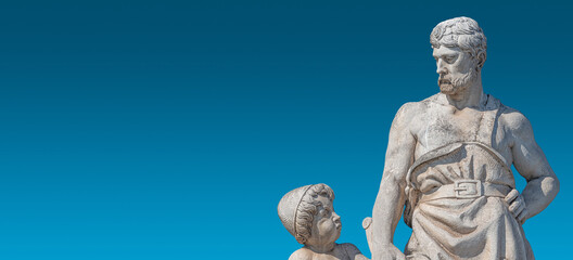 Elderly and young – old sculpture of engineer and his scholar on Zoll Bridge in Magdeburg...