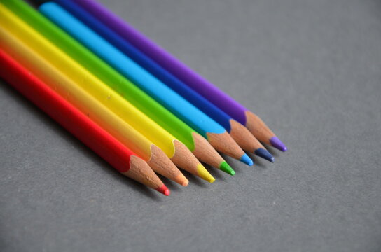 Colored pencils with a grey background
