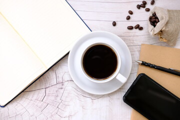 cup of coffee on wooden table