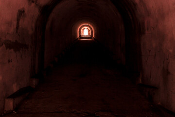 Exit from a mysterious underground corridor illuminated by an ominous red light.
