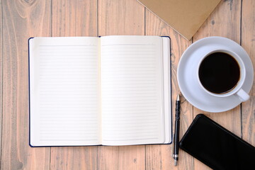 Top view coffee cup and coffee beans on old wood table background, space for text