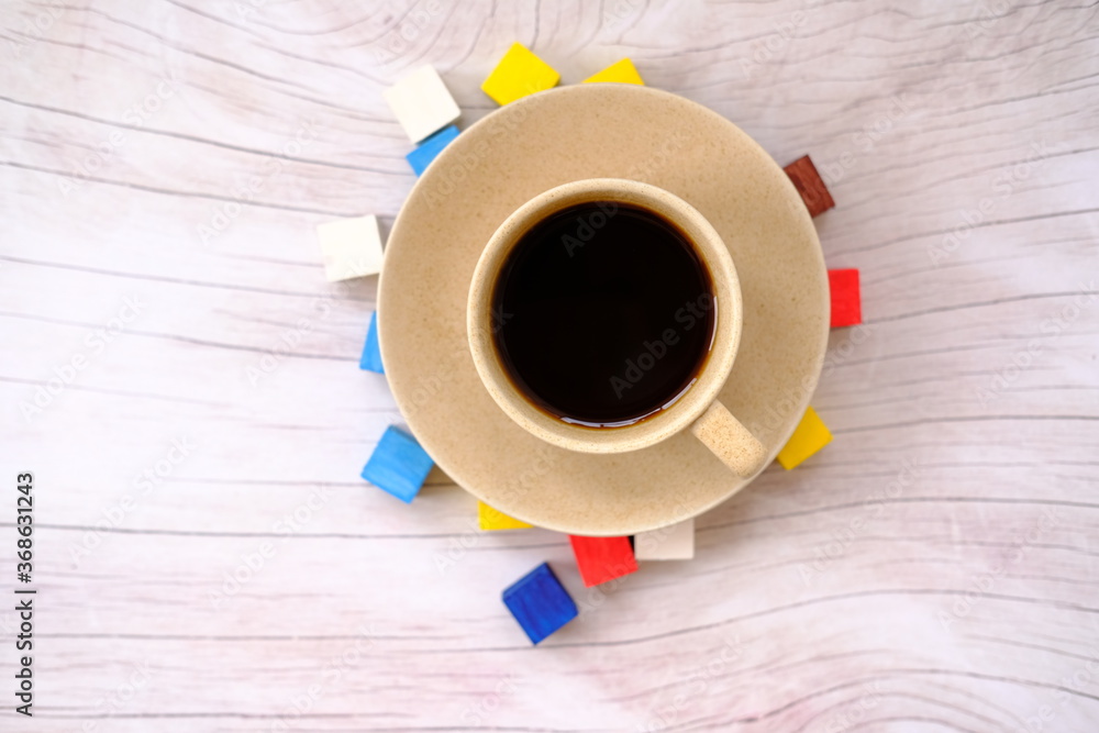 Wall mural a cup of coffee on wood table and space for text