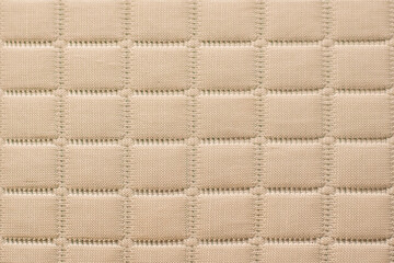 Soft blurred rectangular grid fabric texture background.