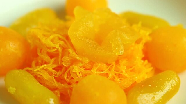 Gold egg yolk drop and Ball plated dessert, Thai dessert