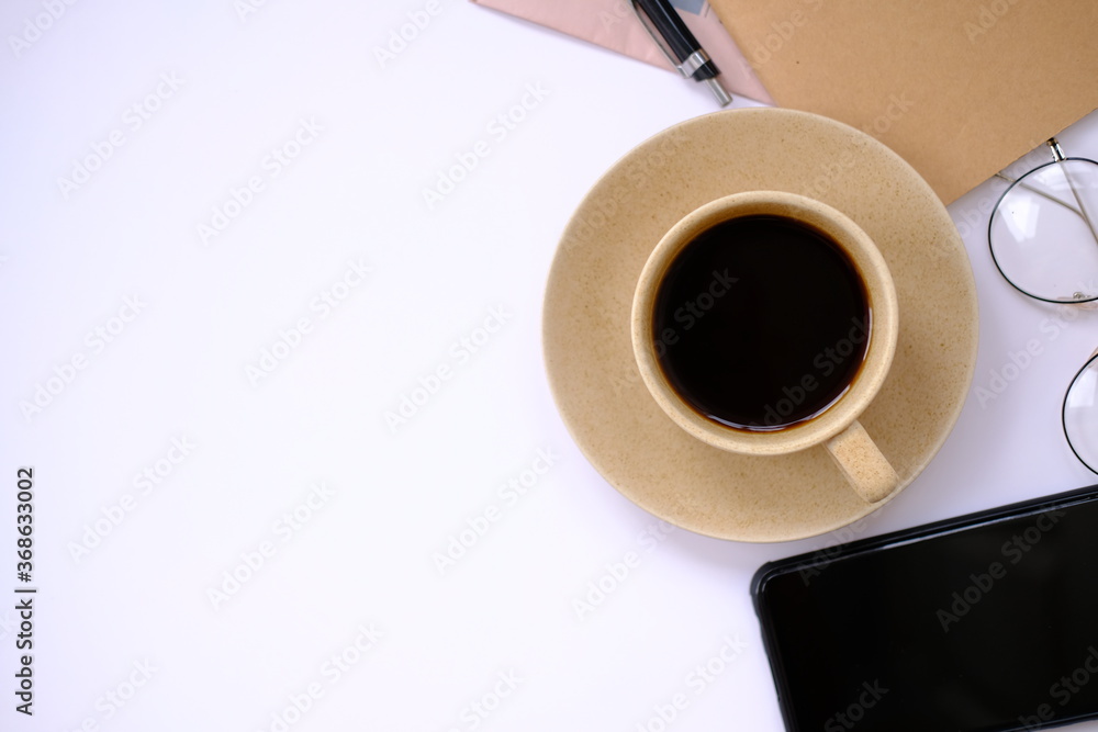 Poster cup of coffee and coffee beans on table background