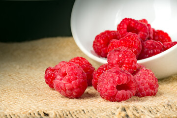Fresh harvest of red raspberries close up.