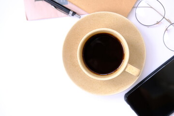cup of coffee on wooden table