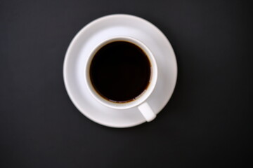 Top view coffee cup and coffee beans on old wood table background, space for text