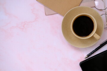 Top view coffee cup and coffee beans on old wood table background, space for text