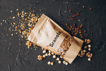 a delicious serving of granola on a dark textured table