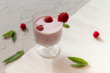 Yogurt smoothie with raspberries, fruit dessert. Berry smoothie. healthy dieting concept