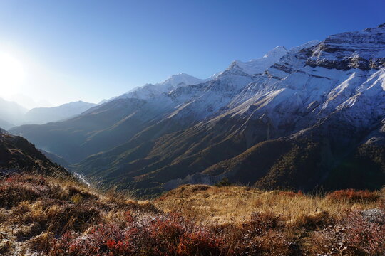Snow covered mountains up-close seen from Khangsar, on the way to Tilicho Lake, Manang, Nepal. The high mountains are a part of Annapurna Mountain Range.