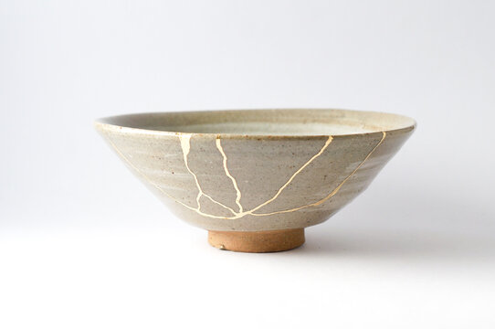 Antique kintsugi, tea pottery set chawan bowl restored with gold.