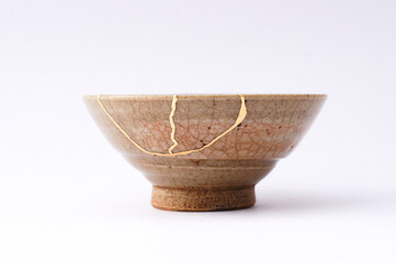 Antique Japanese kintsugi sake cup. Handmade ceramic restored with the ancient traditional Japanese technique.