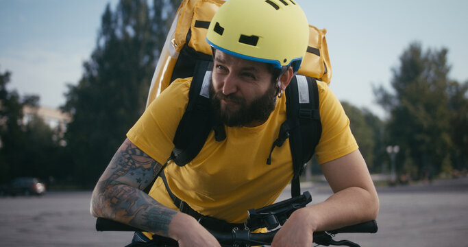 Bicycle messenger taking a break