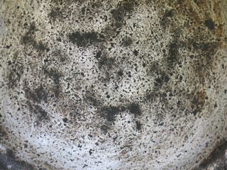scratched bottom of an old iron pot, brutal metal background