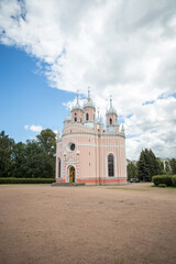 Russian Christian church in the park. Chesme church in the city of St. Petersburg, Russia. Blue sky and summer nice weather. Image with selective color.