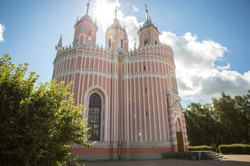 Russian Christian church in the park. Chesme church in the city of St. Petersburg, Russia. Blue sky and summer nice weather. Image with selective color.