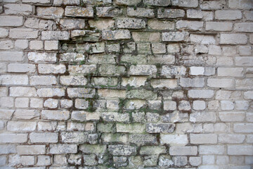 Obraz premium Real old brick wall crumbling from time to time
