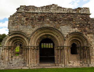 Fototapeta na wymiar The Chapter House in the ruins of the 12th century Haughmond Abbey - a medieval Augustinian monastery near Shrewsbury in Shropshire, England - now in the care of English Heritage.