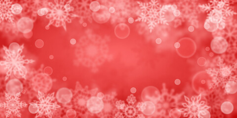 Christmas background of blurry snowflakes in red colors