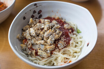 Korean food seafood noodle Soup with clams.