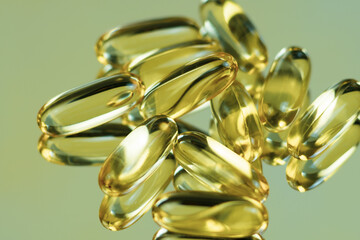 Fish oil capsules on the mirror