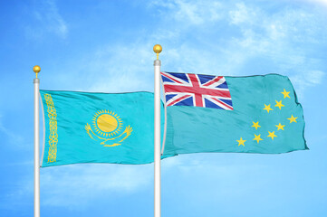 Kazakhstan and Tuvalu two flags on flagpoles and blue sky