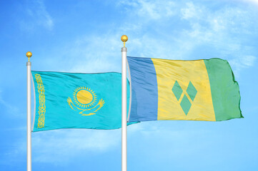 Kazakhstan and Saint Vincent and the Grenadines two flags on flagpoles